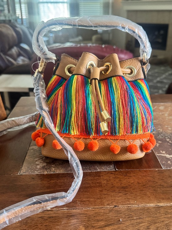 Milly Handbags - NWT Milly Tan Bucket Bag Crossbody with Rainbow Fringe and Orange Pom-Poms